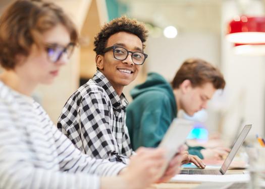 STOCK PHOTO - Teen students using computers