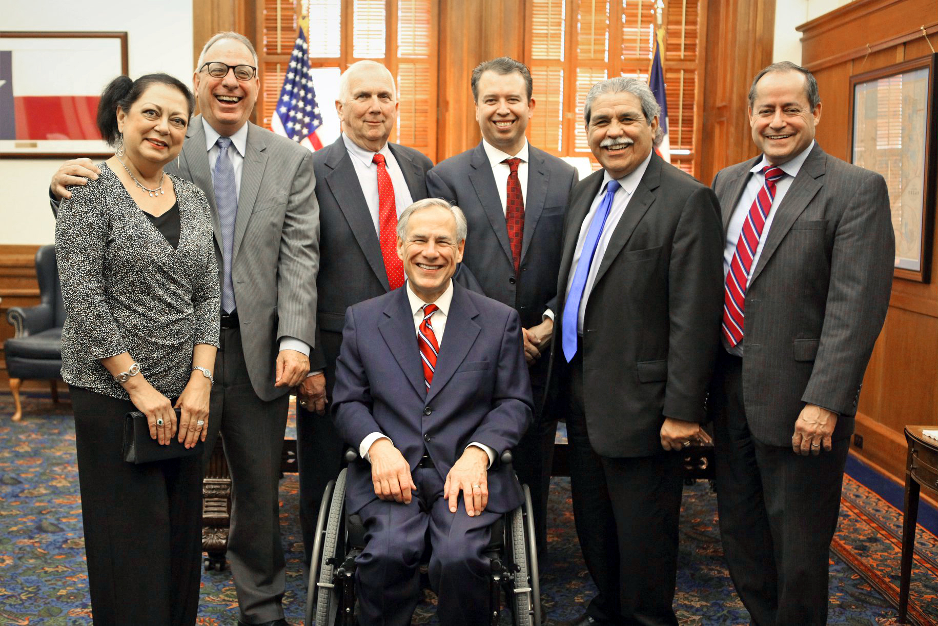 Gov. Greg Abbott with Dr. James Wilcox, Longview ISD Superintendent, and various dignitaries.