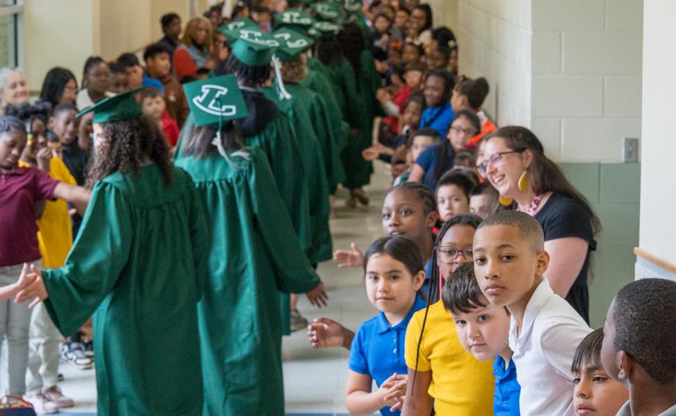 students waiting for seniors