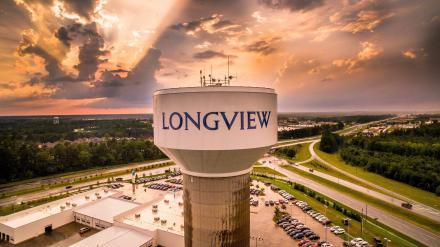 Longview, Texas water tower cloudy day