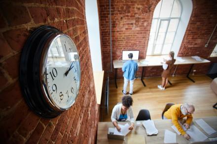 STOCK PHOTO - School time featuring a prominent clock