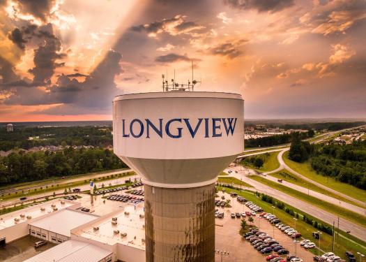 Longview, Texas water tower cloudy day
