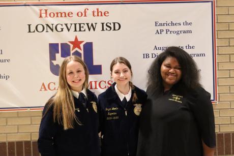 Kaylee Swaim, Brynn Woods, and Mar'Chella Miller pose for a photo