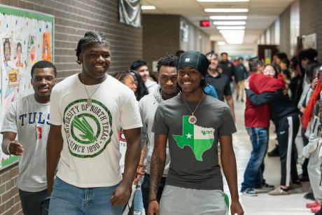 Smiling seniors take part in the first ever Lobo Signing Day